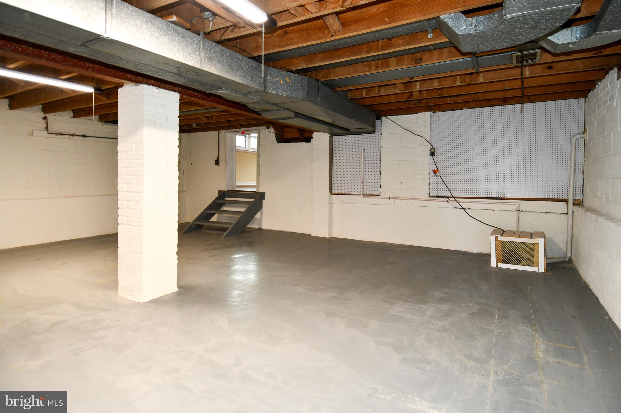 10304 Inwood Avenue Silver Spring, MD 20902 - Photo 22 of 24 a view of storage and utility room