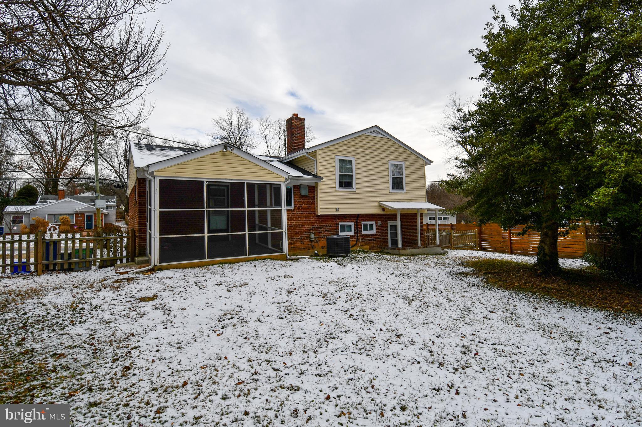 10304 Inwood Avenue Silver Spring, MD 20902 - Photo 23 of 24 a front view of a house with a yard and garage
