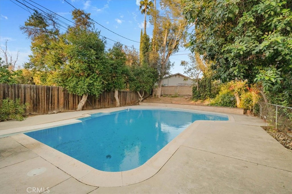 2807 Wyoming Way Riverside, CA 92506 - Photo 28 of 40 a view of outdoor space and swimming pool