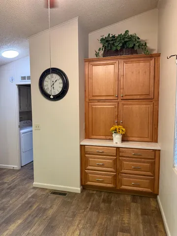 a kitchen with a stove and a microwave