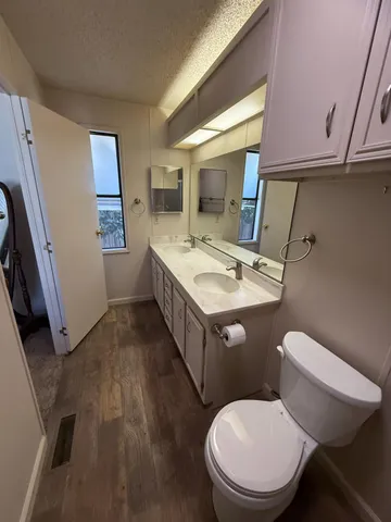 a bedroom with a bed and a table in it