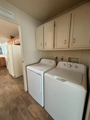 a view of living room kitchen with furniture
