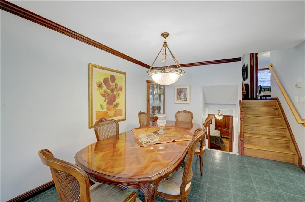 1262 East 73rd Street Brooklyn, NY 11234 - Photo 6 of 26 a dining room with furniture and window