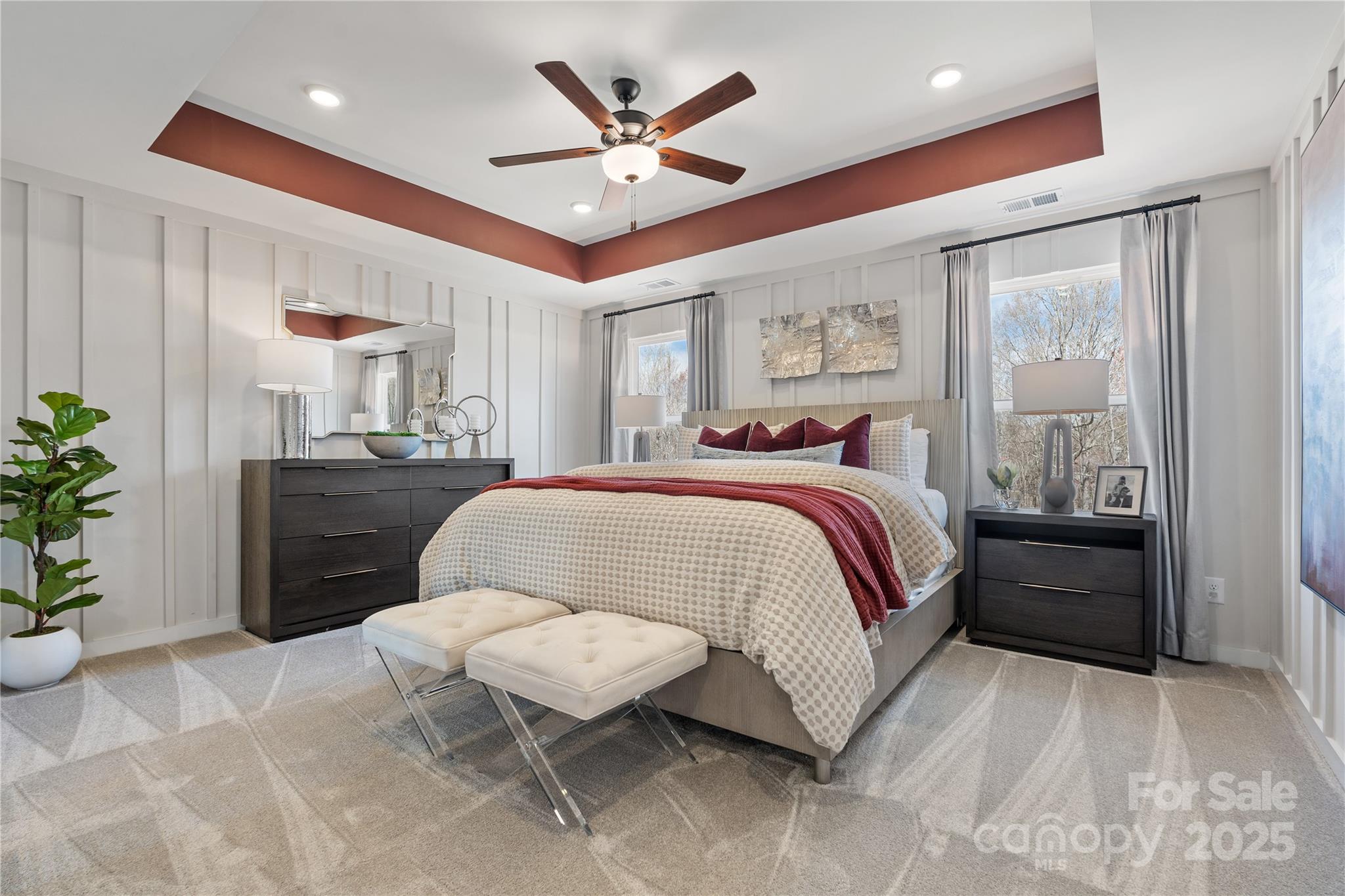 2042 Puddle Pond Road Indian Trail, NC 28079 - Photo 11 of 21 a bedroom with a bed large window and potted plant