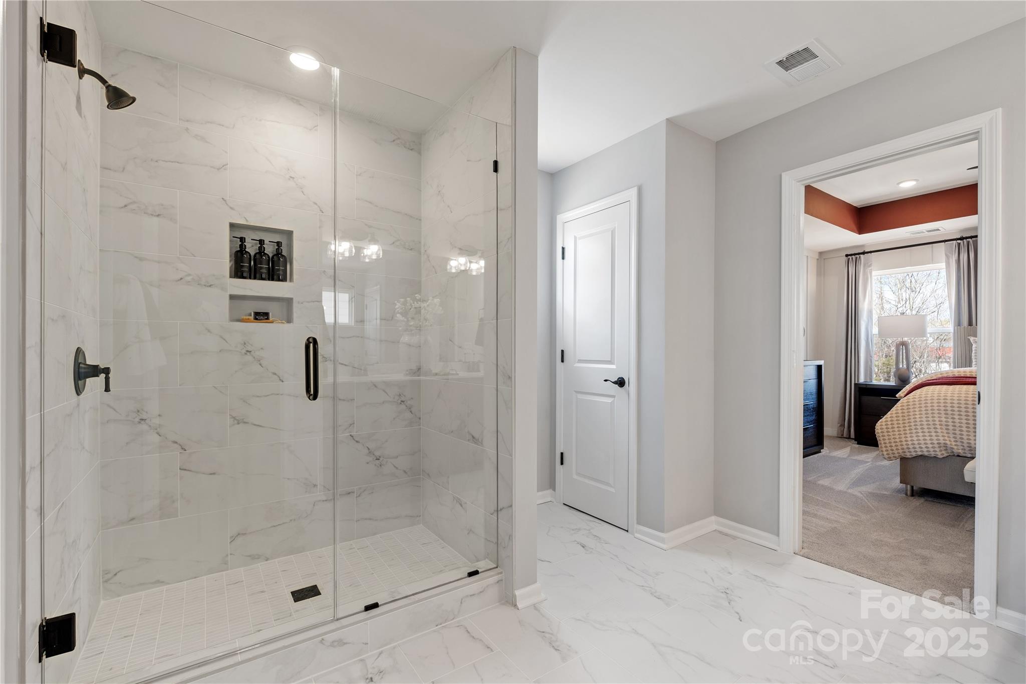 2042 Puddle Pond Road Indian Trail, NC 28079 - Photo 13 of 21 a bathroom with a shower