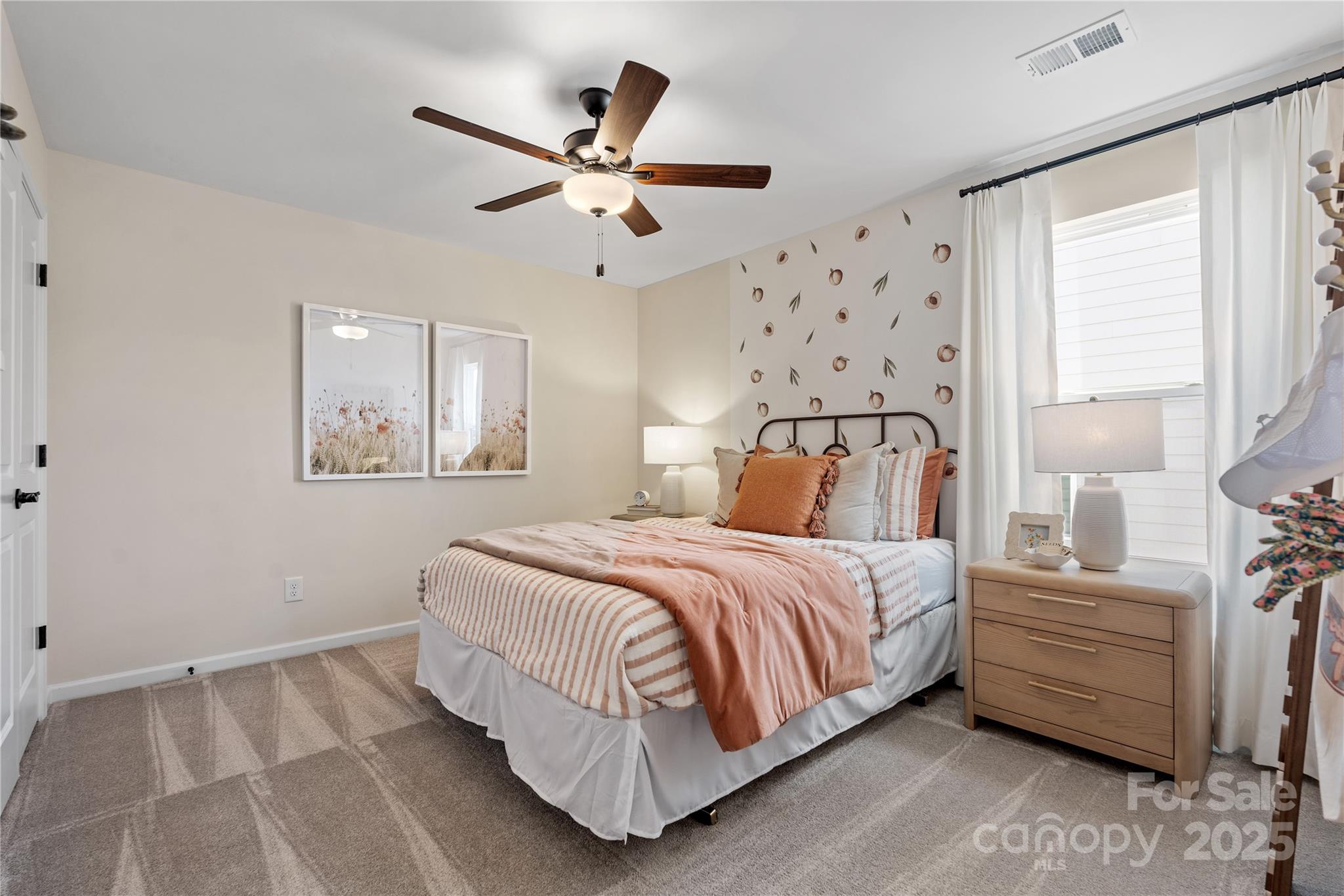 2042 Puddle Pond Road Indian Trail, NC 28079 - Photo 16 of 21 a bedroom with a bed and window