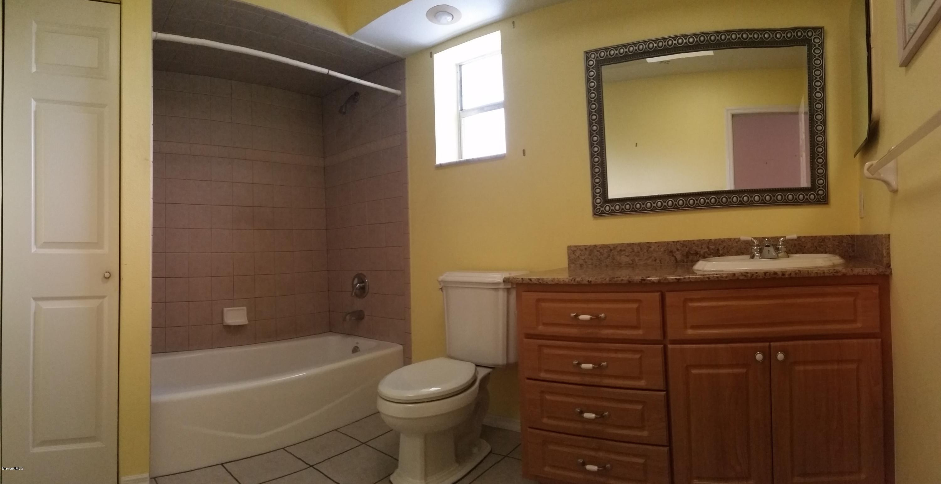 2420 Harlock Road Melbourne, FL 32934 - Photo 14 of 47 Hall Bath Remodeled