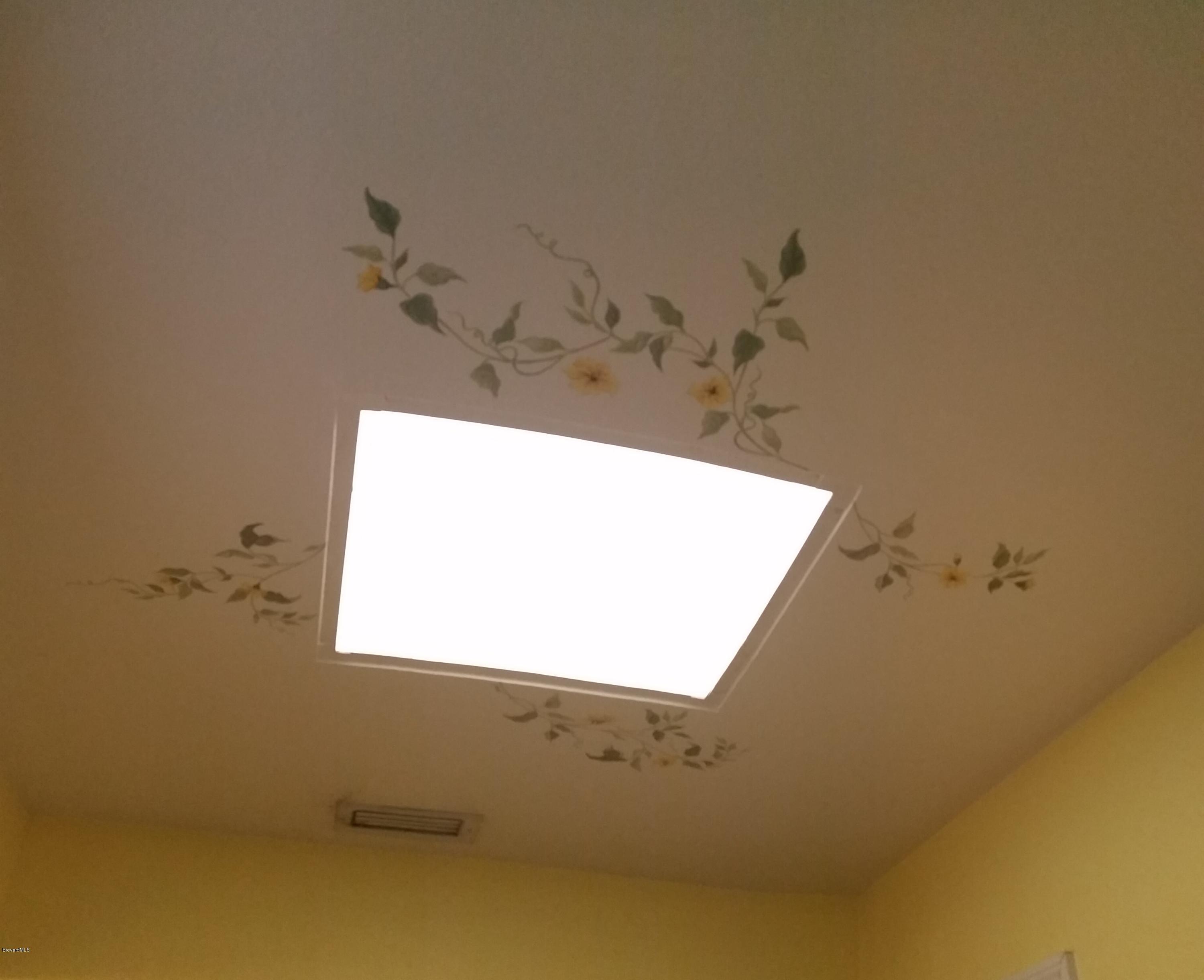 2420 Harlock Road Melbourne, FL 32934 - Photo 15 of 47 Custom Paint Hall Bath Skylight