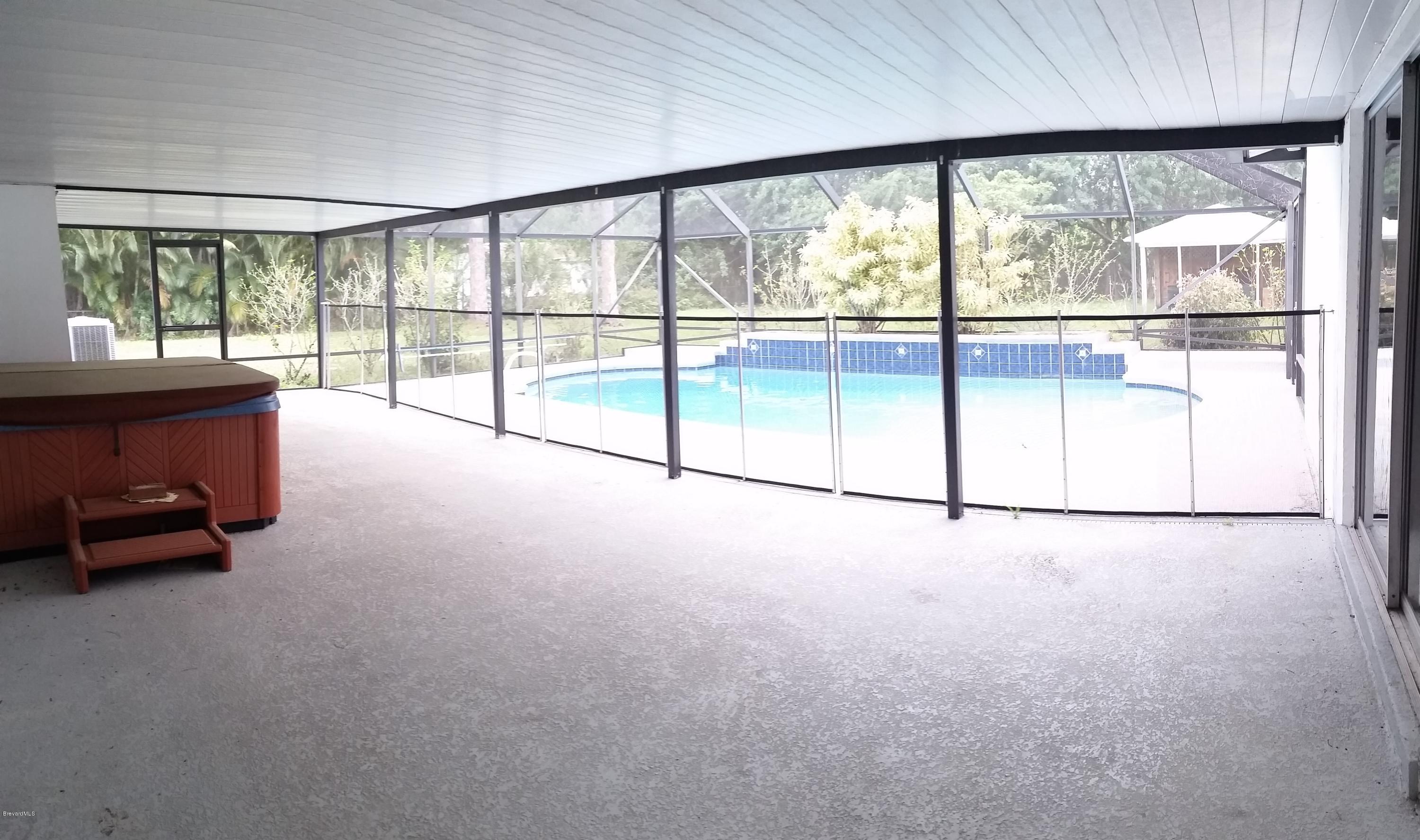 2420 Harlock Road Melbourne, FL 32934 - Photo 23 of 47 POOL Baby Gate Up