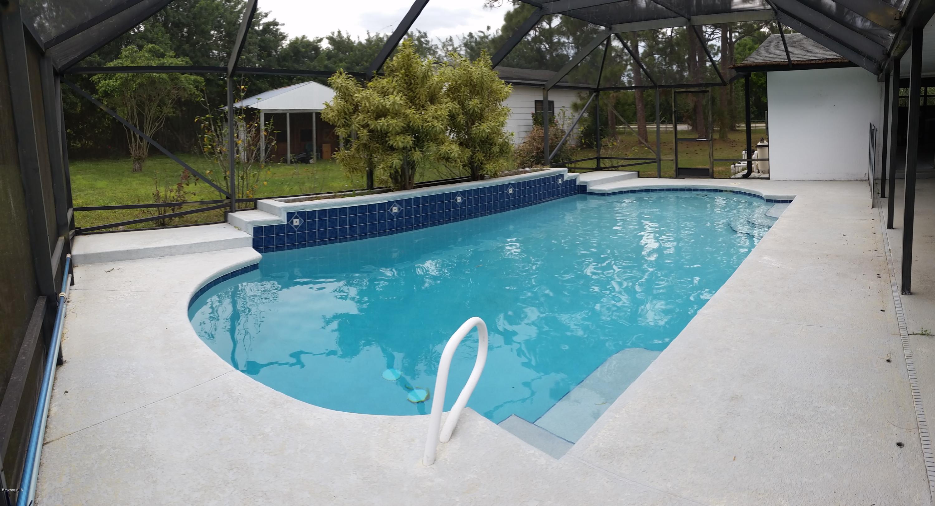 2420 Harlock Road Melbourne, FL 32934 - Photo 24 of 47 HUGE POOL & waterfall