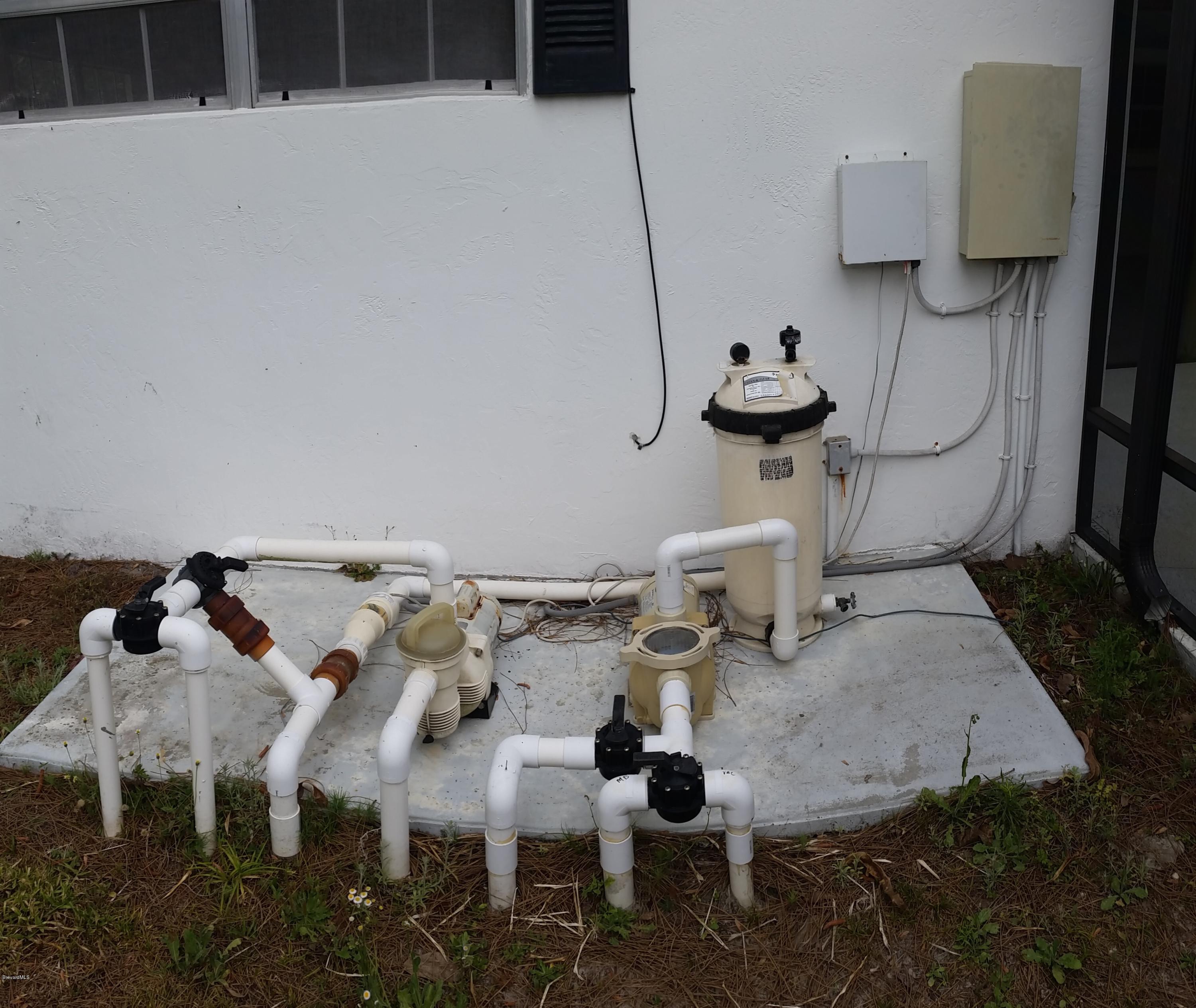 2420 Harlock Road Melbourne, FL 32934 - Photo 32 of 47 POOL Equipment waterfall