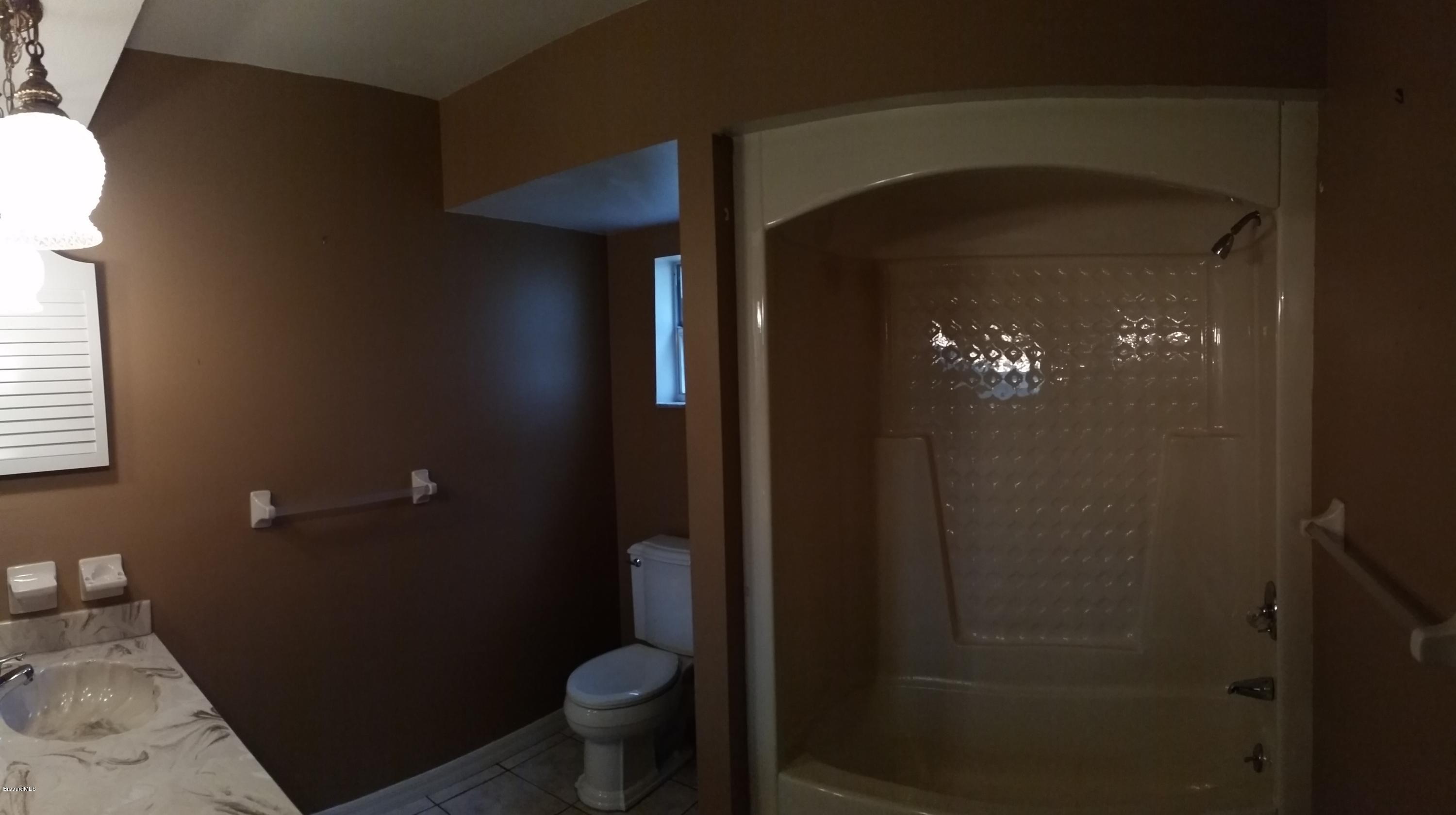 2420 Harlock Road Melbourne, FL 32934 - Photo 7 of 47 Downstairs FULL bath