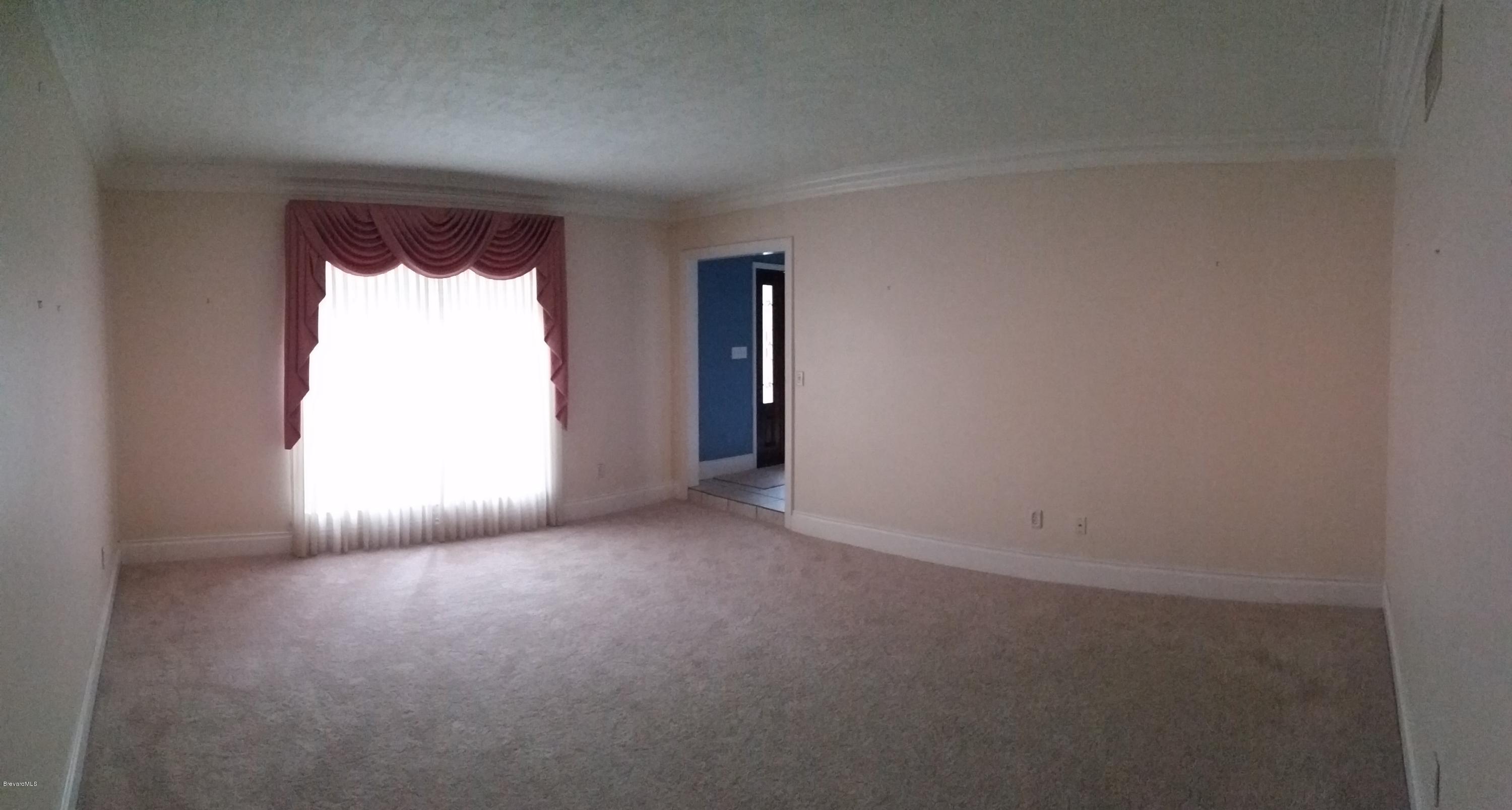 2420 Harlock Road Melbourne, FL 32934 - Photo 9 of 47 Formal Living Room