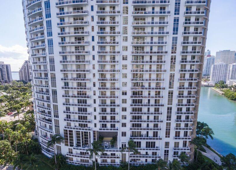 901 Brickell Key Boulevard, Unit 906 Miami, FL 33131 - Photo 3 of 60 a view of a city with tall buildings