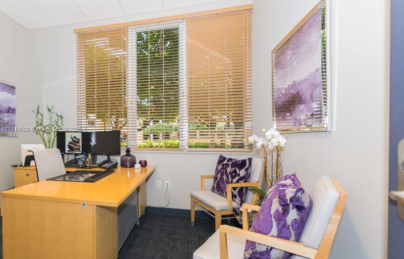 901 Brickell Key Boulevard, Unit 906 Miami, FL 33131 - Photo 59 of 60 a view of a livingroom with furniture and window