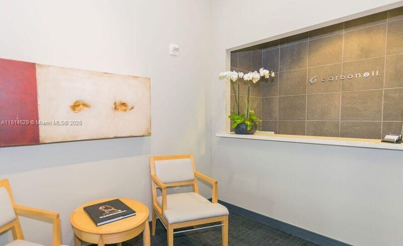 901 Brickell Key Boulevard, Unit 906 Miami, FL 33131 - Photo 60 of 60 a bathroom with a toilet a sink and a shower