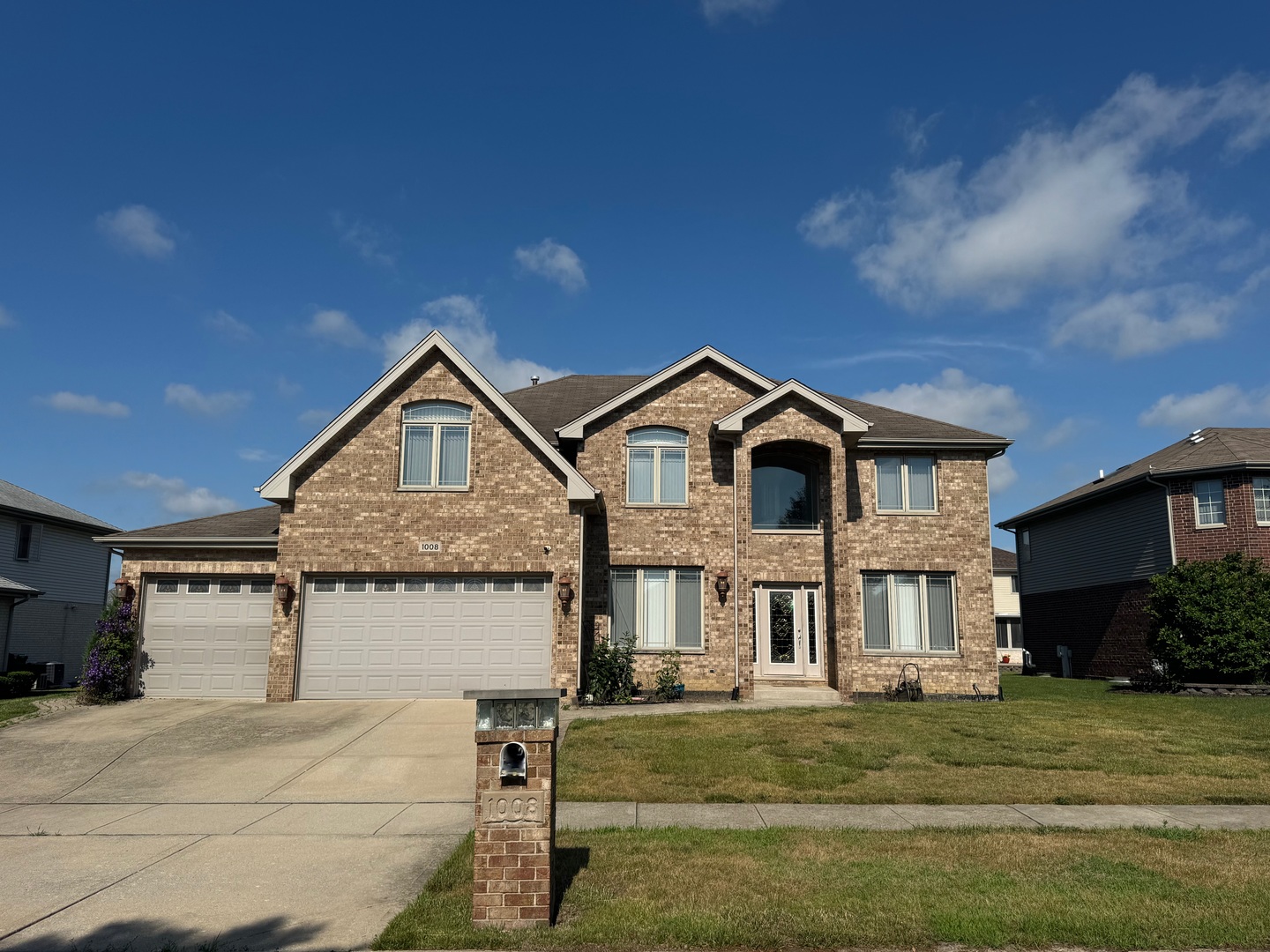 1008 Willow Road Matteson, IL 60443 - Photo 1 of 19 a front view of a house with a yard