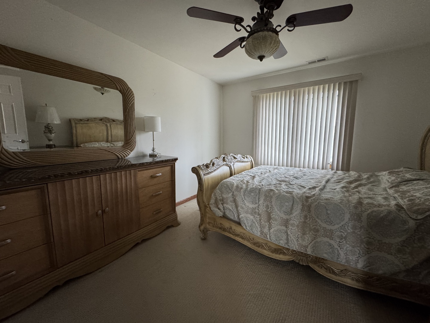 1008 Willow Road Matteson, IL 60443 - Photo 17 of 19 a bedroom with a bed and window