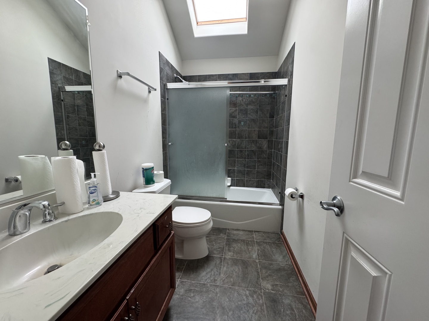 1008 Willow Road Matteson, IL 60443 - Photo 18 of 19 a bathroom with a sink a toilet and shower
