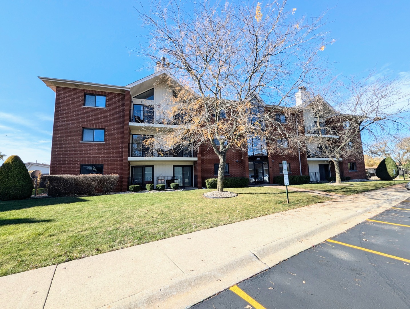 a house view with a sitting space and garden