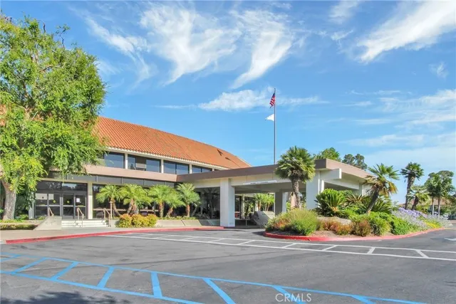 a view of a building with a garden
