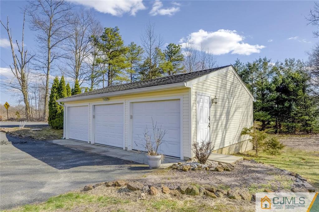 202 Higgins Road Old Bridge, NJ 07747 - Photo 20 of 25 a view of a house with a snow