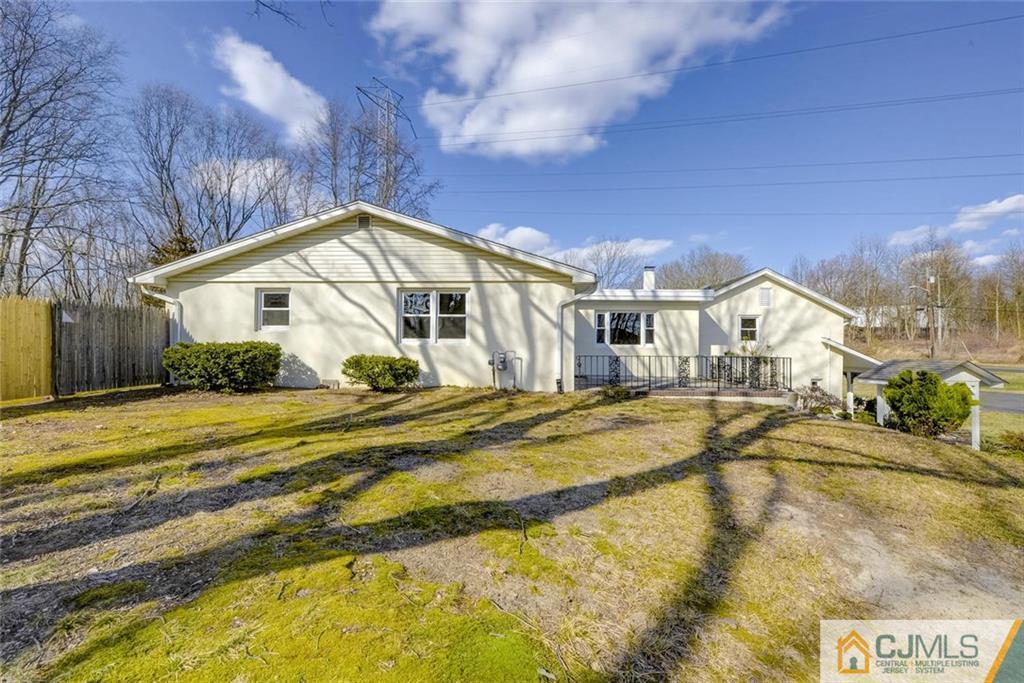 202 Higgins Road Old Bridge, NJ 07747 - Photo 21 of 25 a view of a house with a swimming pool