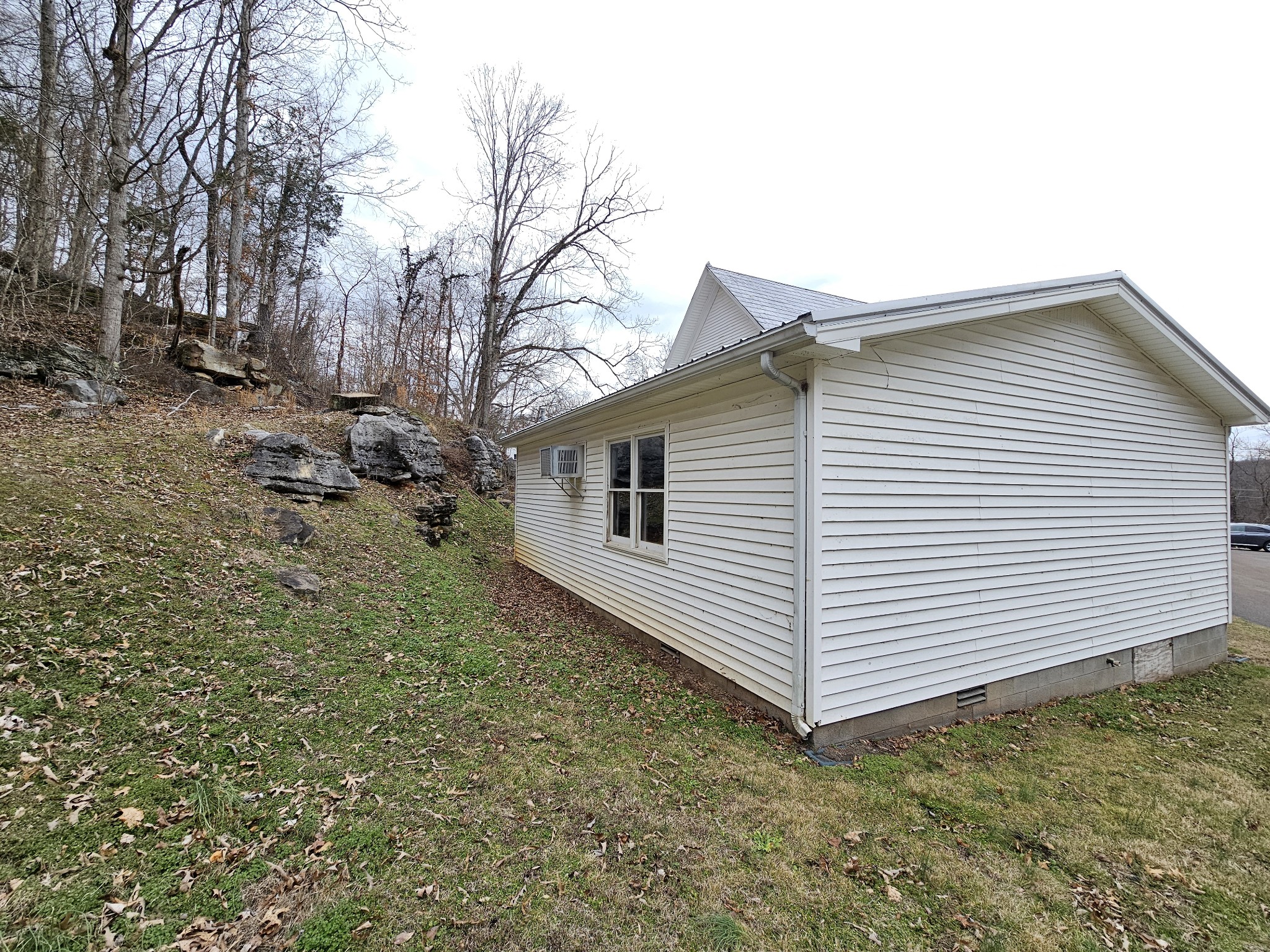 1124 Leach Road Cumberland Furnace, TN 37051 - Photo 6 of 18 a view of a house with a yard