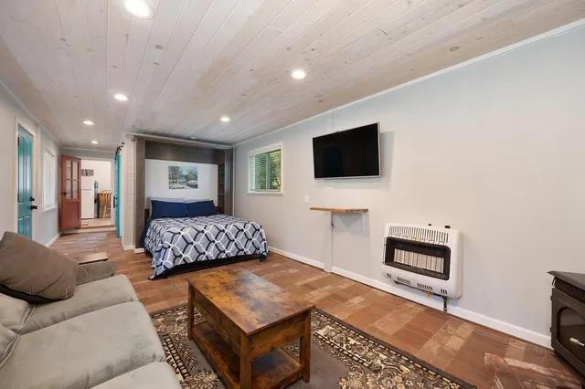 a bathroom with a shower and a toilet