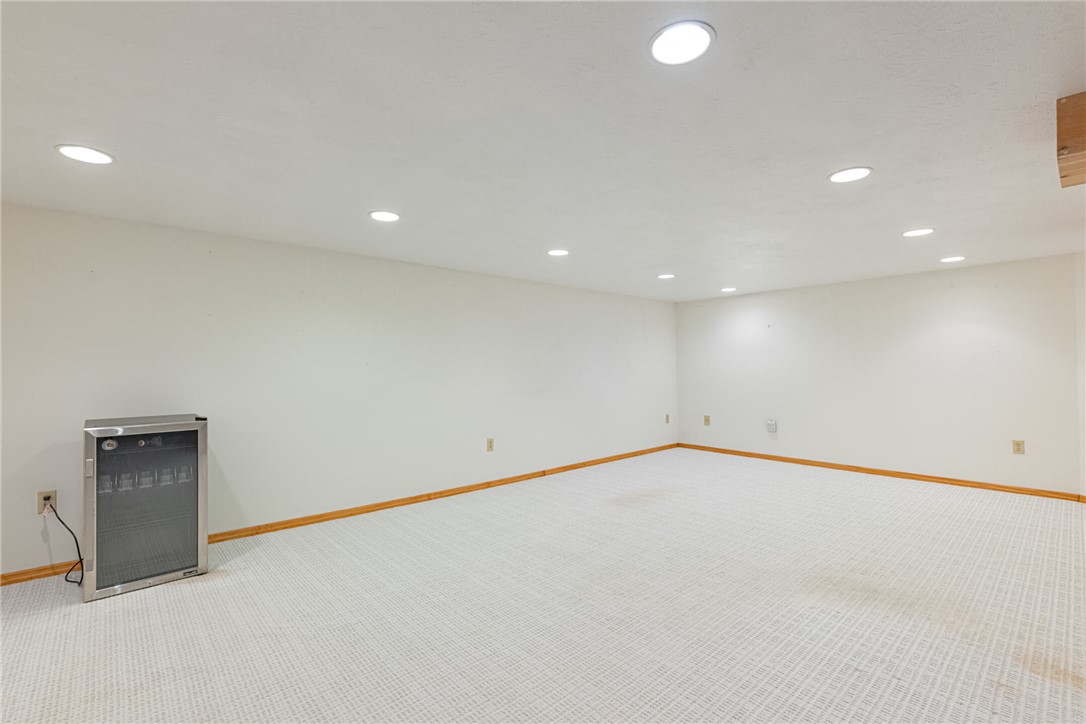 5235 West Ridgewood Road Springfield, OH 45503 - Photo 21 of 32 This spacious, carpeted room offers versatile living possibilities with ample lighting.