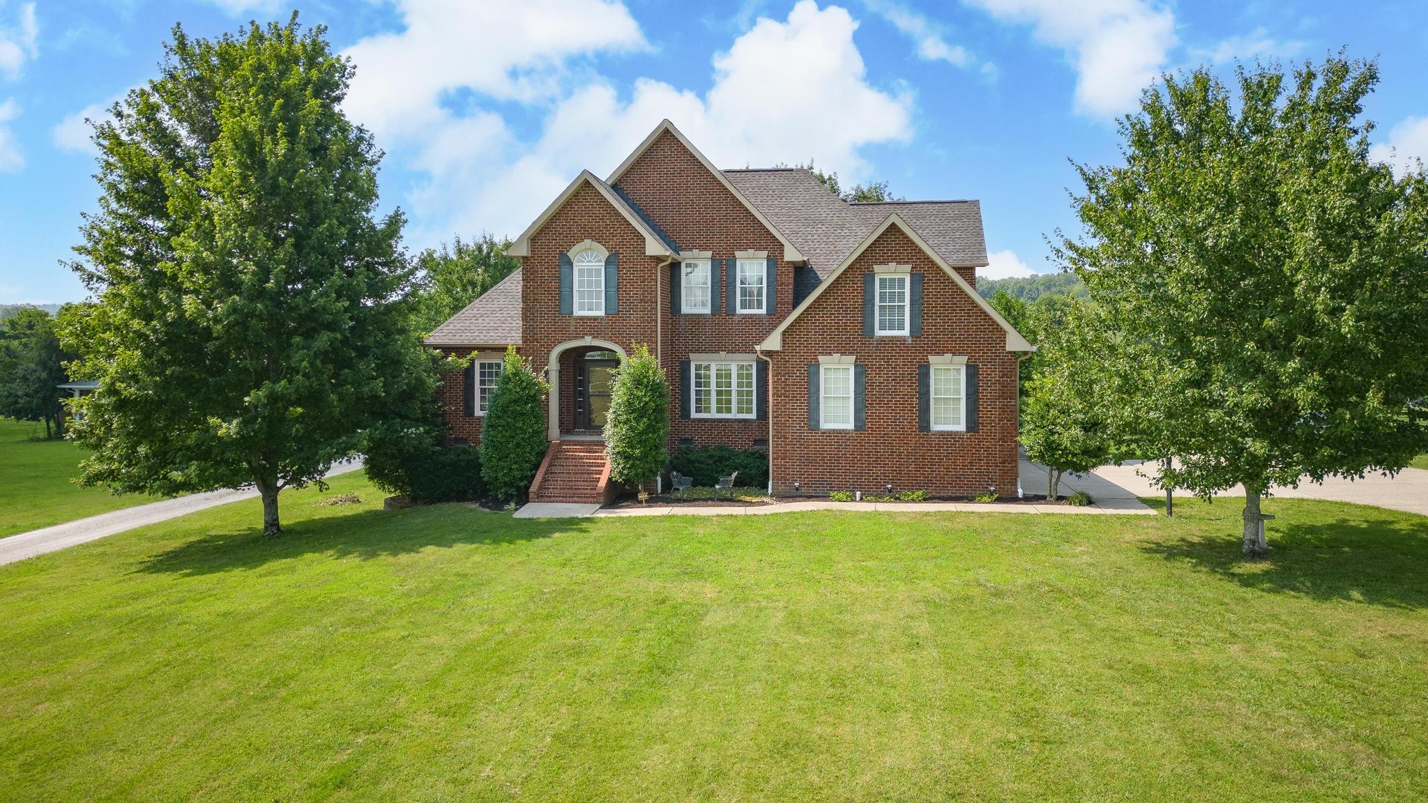 3991 Franklin Road Lebanon, TN 37090 - Photo 1 of 62 a front view of a house with a yard