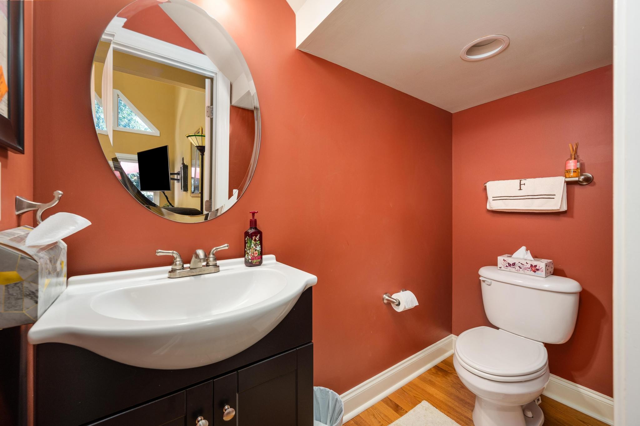 3991 Franklin Road Lebanon, TN 37090 - Photo 21 of 62 a bathroom with a toilet a sink and mirror