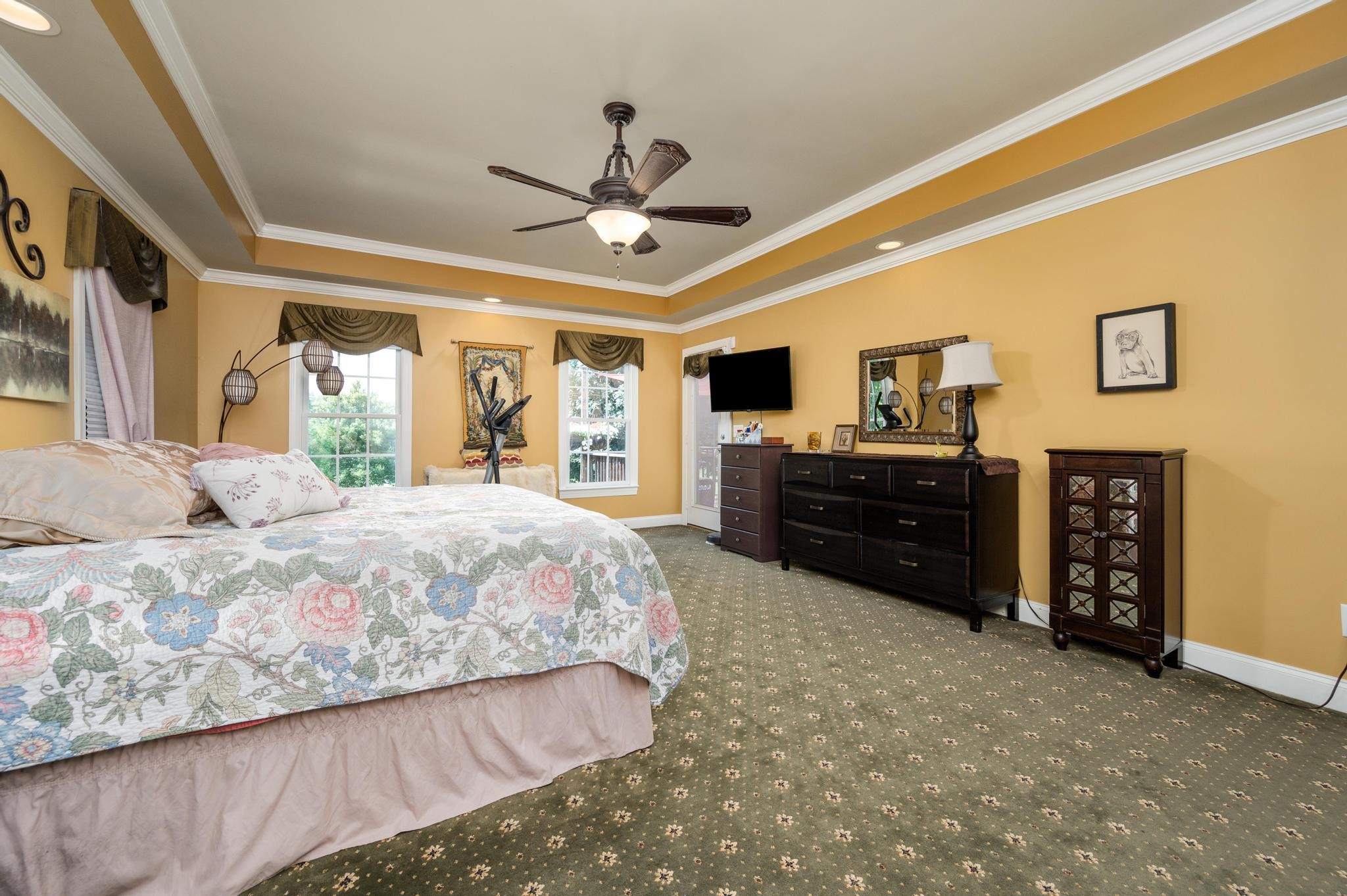 3991 Franklin Road Lebanon, TN 37090 - Photo 23 of 62 a spacious bedroom with a bed and a chandelier