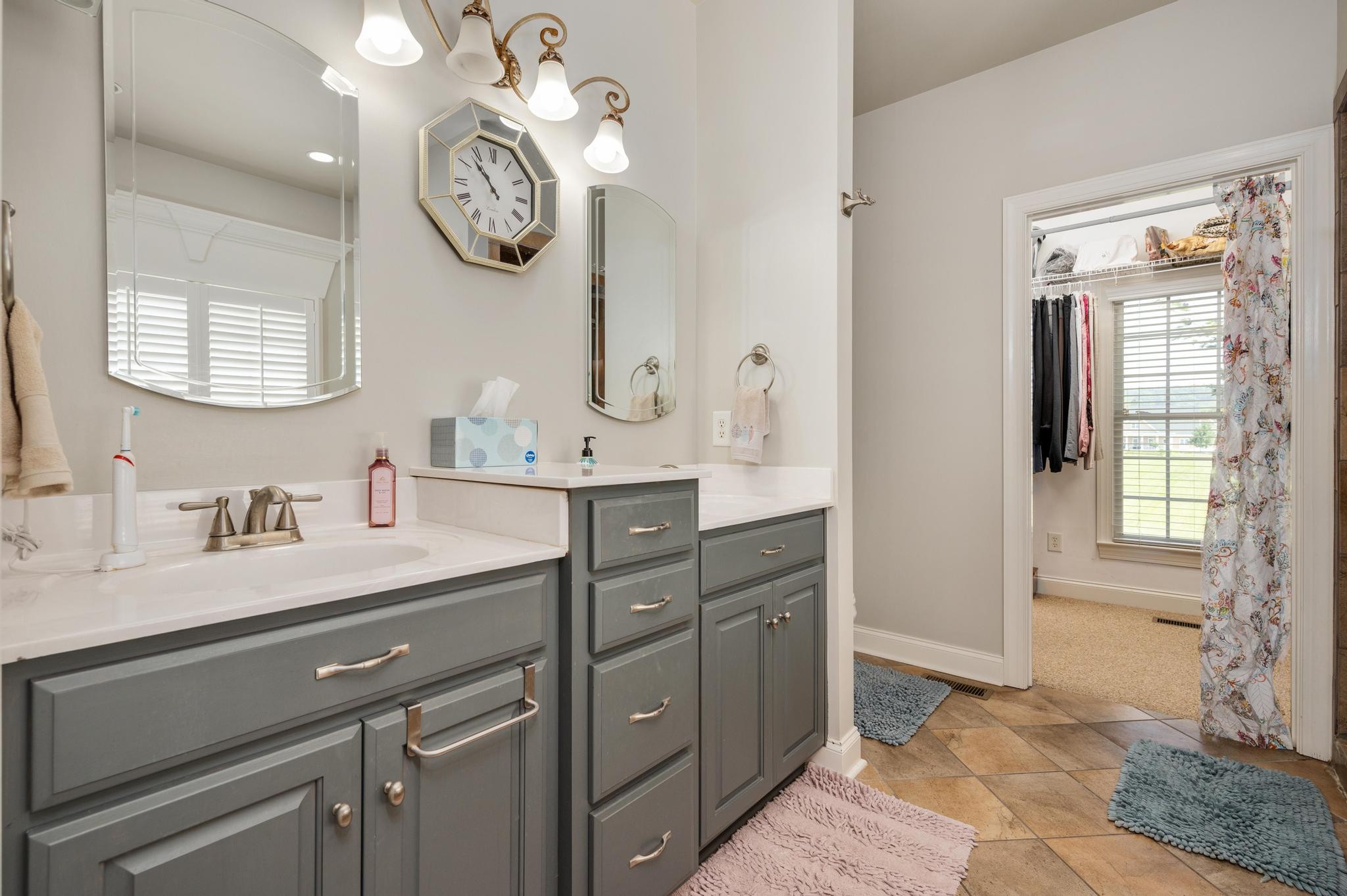 3991 Franklin Road Lebanon, TN 37090 - Photo 24 of 62 a bathroom with a granite countertop sink a mirror and vanity