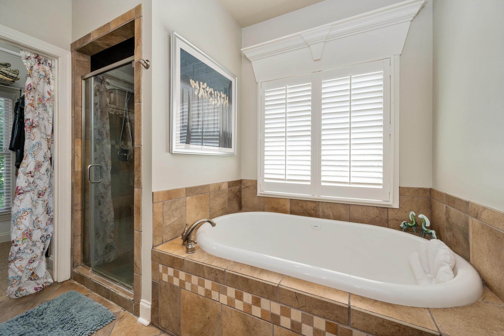 3991 Franklin Road Lebanon, TN 37090 - Photo 26 of 62 a white bath tub sitting in a bathroom next to a window