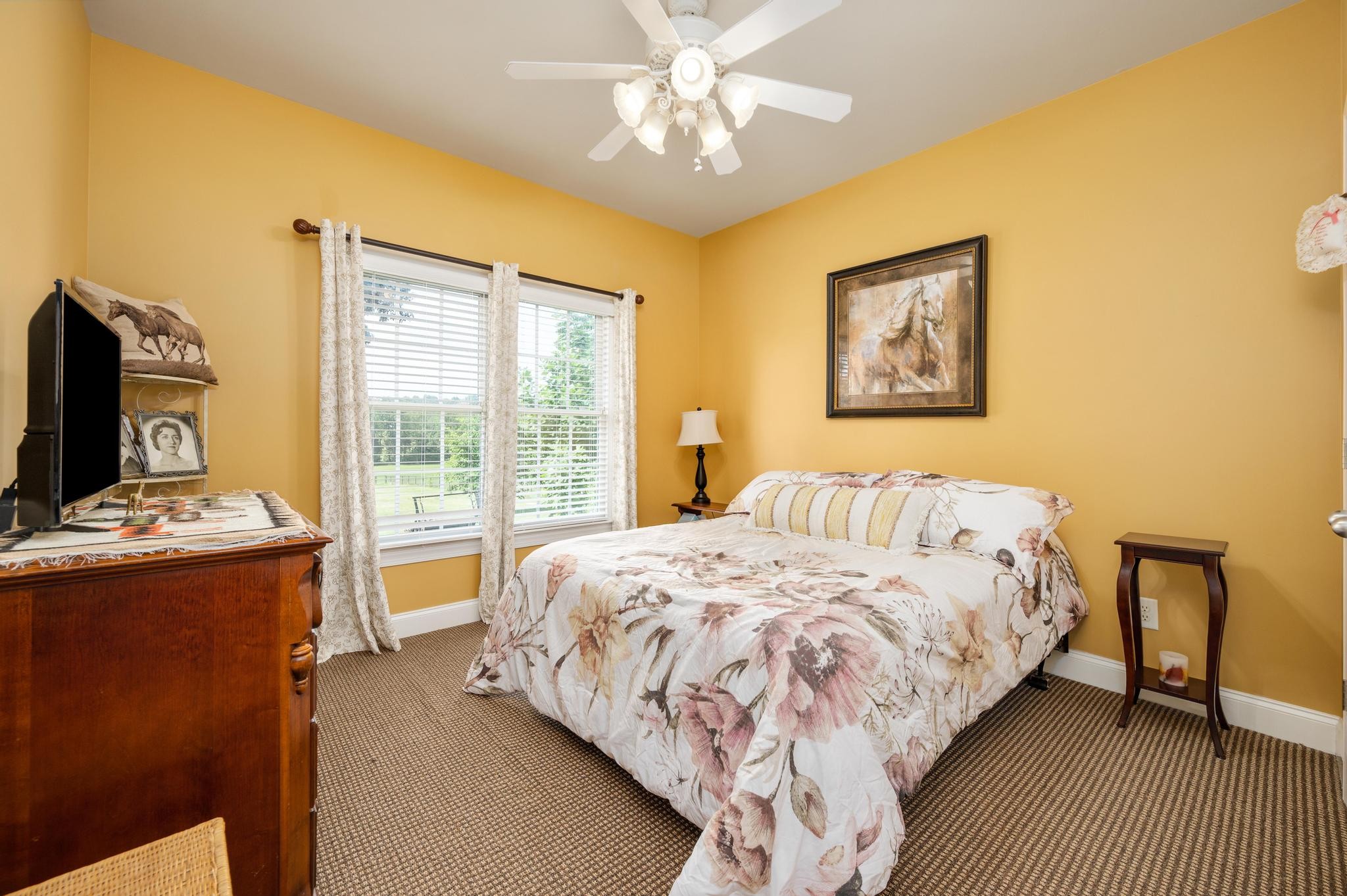 3991 Franklin Road Lebanon, TN 37090 - Photo 27 of 62 a bedroom with a bed and a flat screen tv