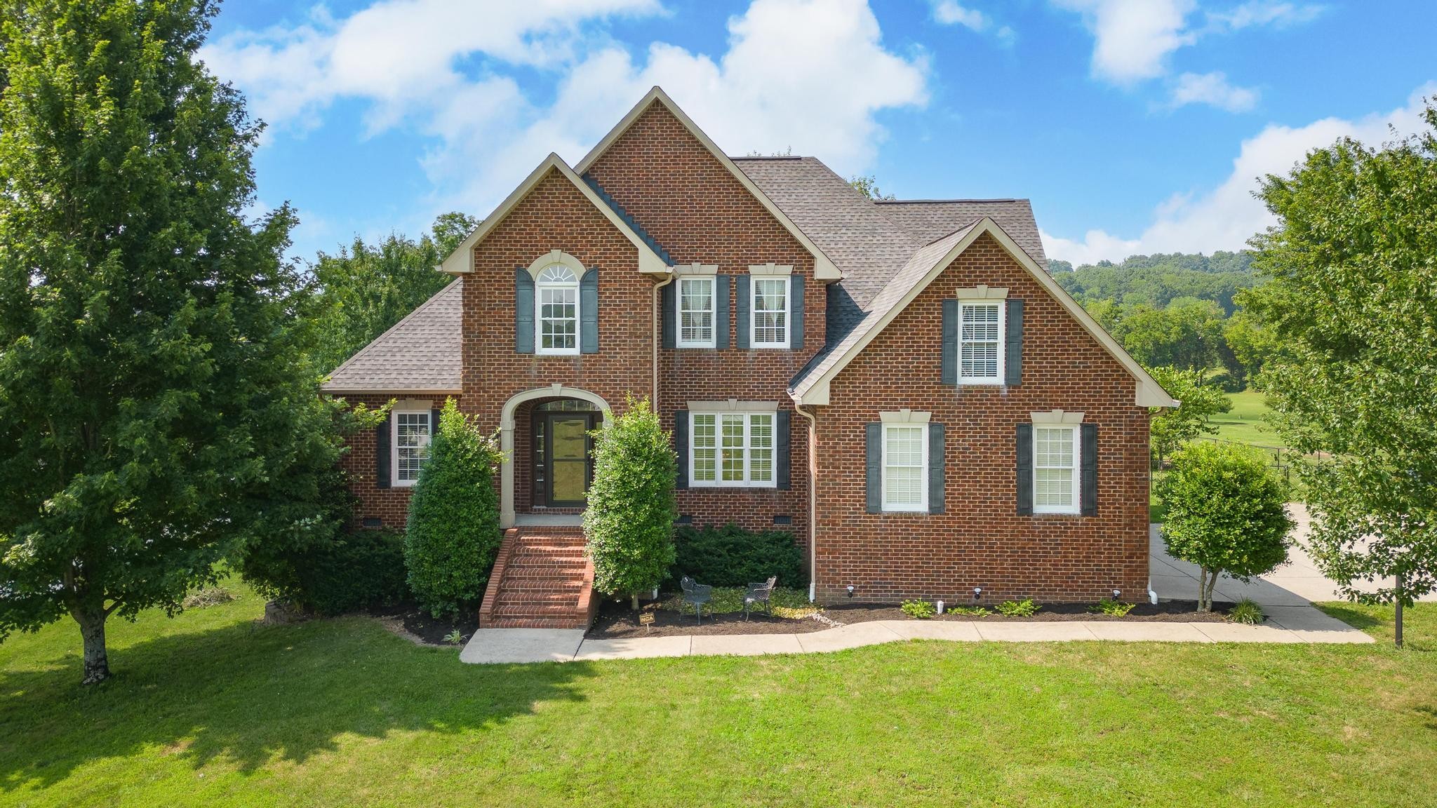 3991 Franklin Road Lebanon, TN 37090 - Photo 3 of 62 a front view of a house with a yard