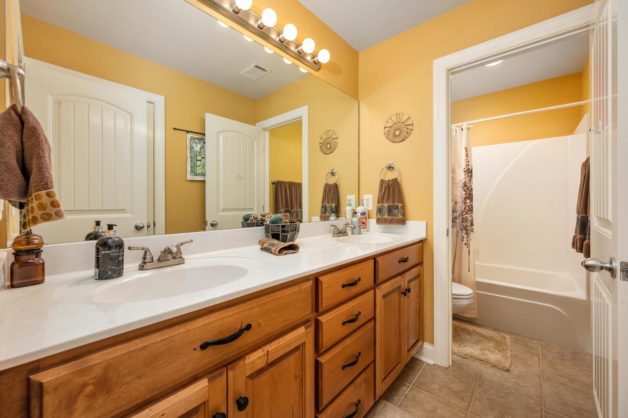 3991 Franklin Road Lebanon, TN 37090 - Photo 31 of 62 a bathroom with a double vanity sink mirror and double