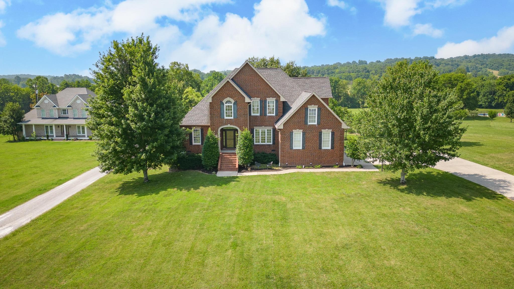 3991 Franklin Road Lebanon, TN 37090 - Photo 4 of 62 a front view of a house with yard and green space