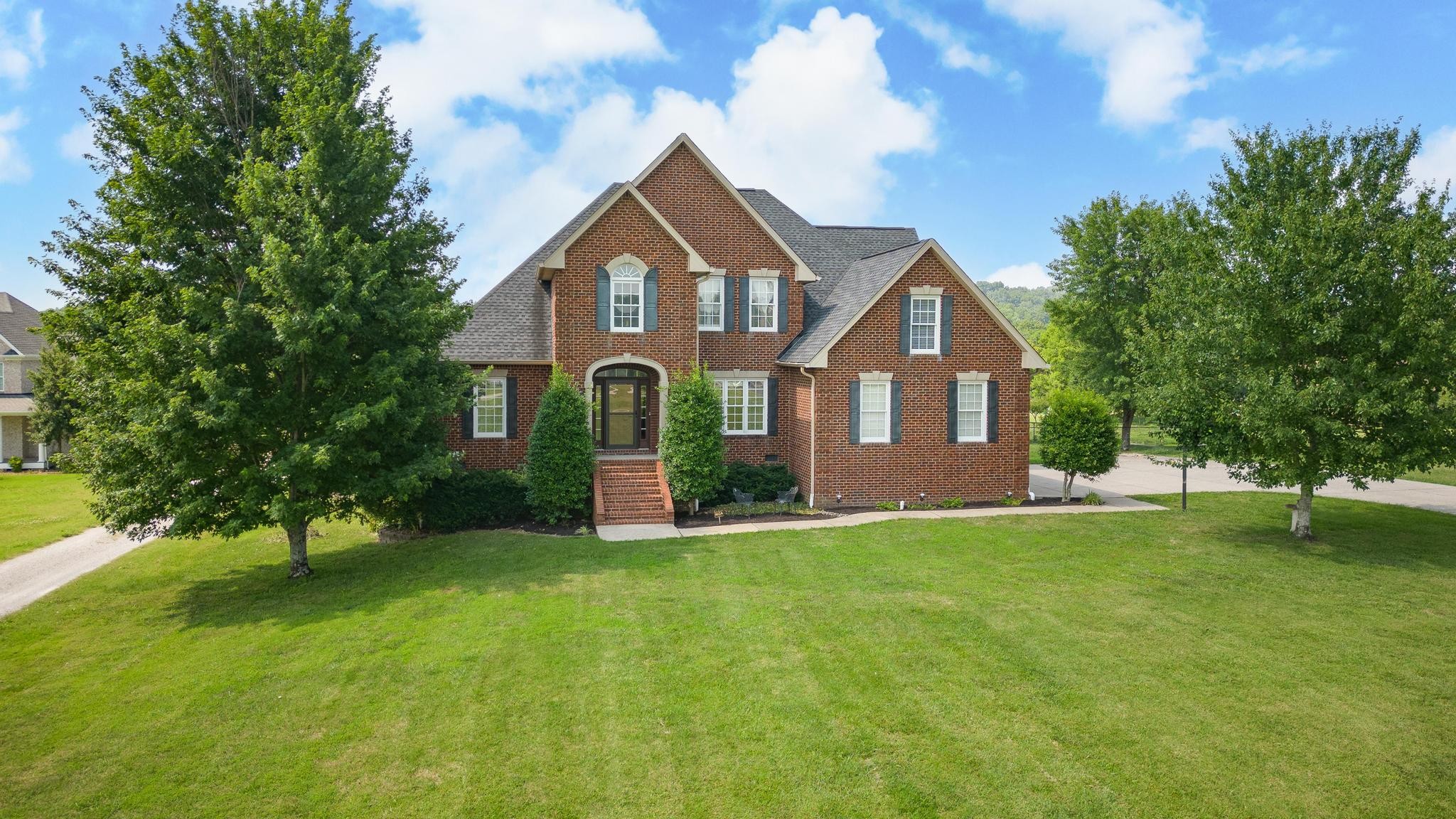 3991 Franklin Road Lebanon, TN 37090 - Photo 5 of 62 a front view of a house with a yard