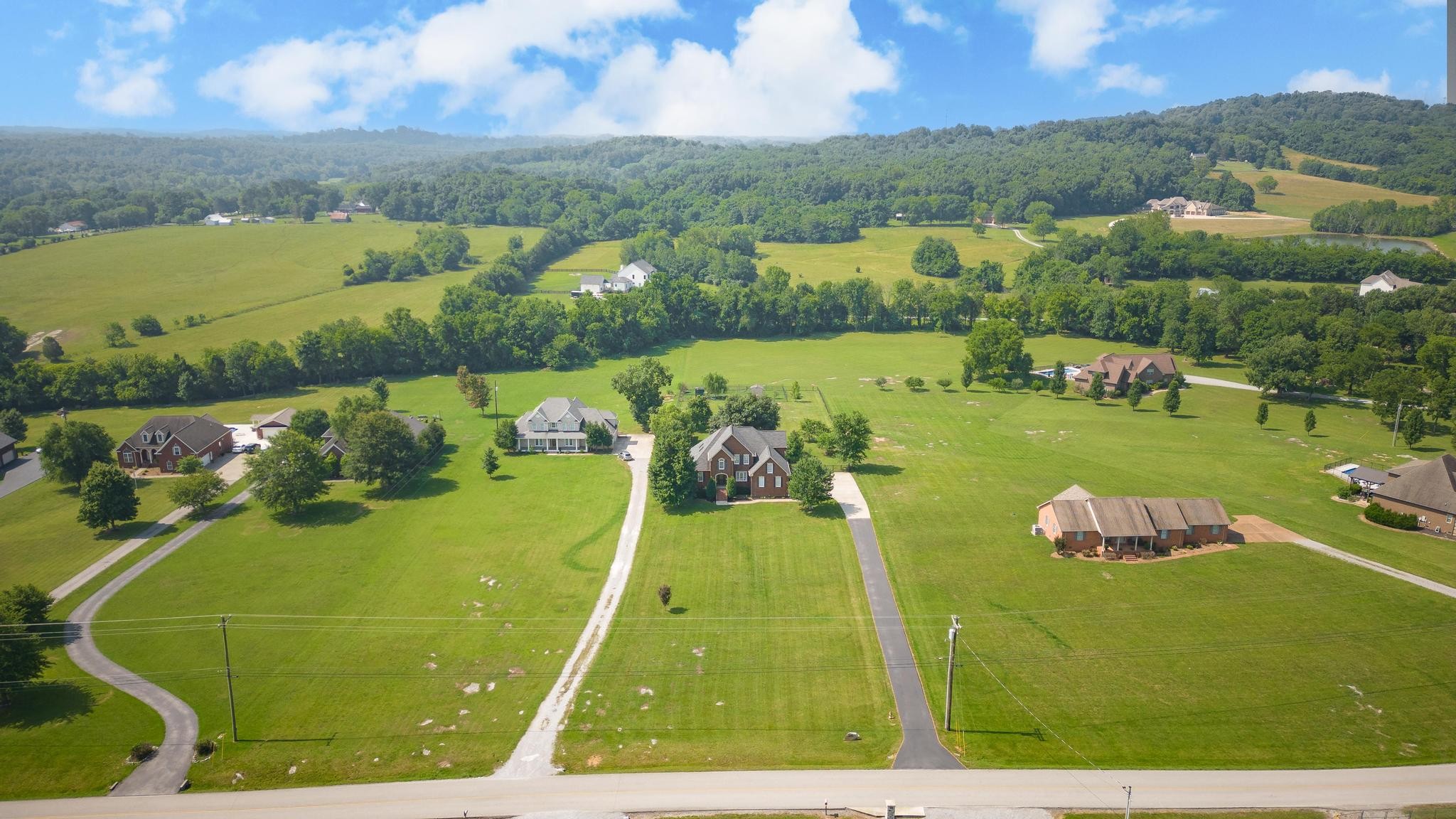 3991 Franklin Road Lebanon, TN 37090 - Photo 54 of 62 an aerial view of a golf course with lawn chairs