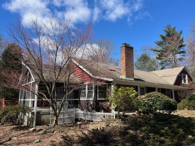 38 Lantern Ridge Road New Canaan, CT 06840 - Photo 1 of 17 a front view of houses with yard