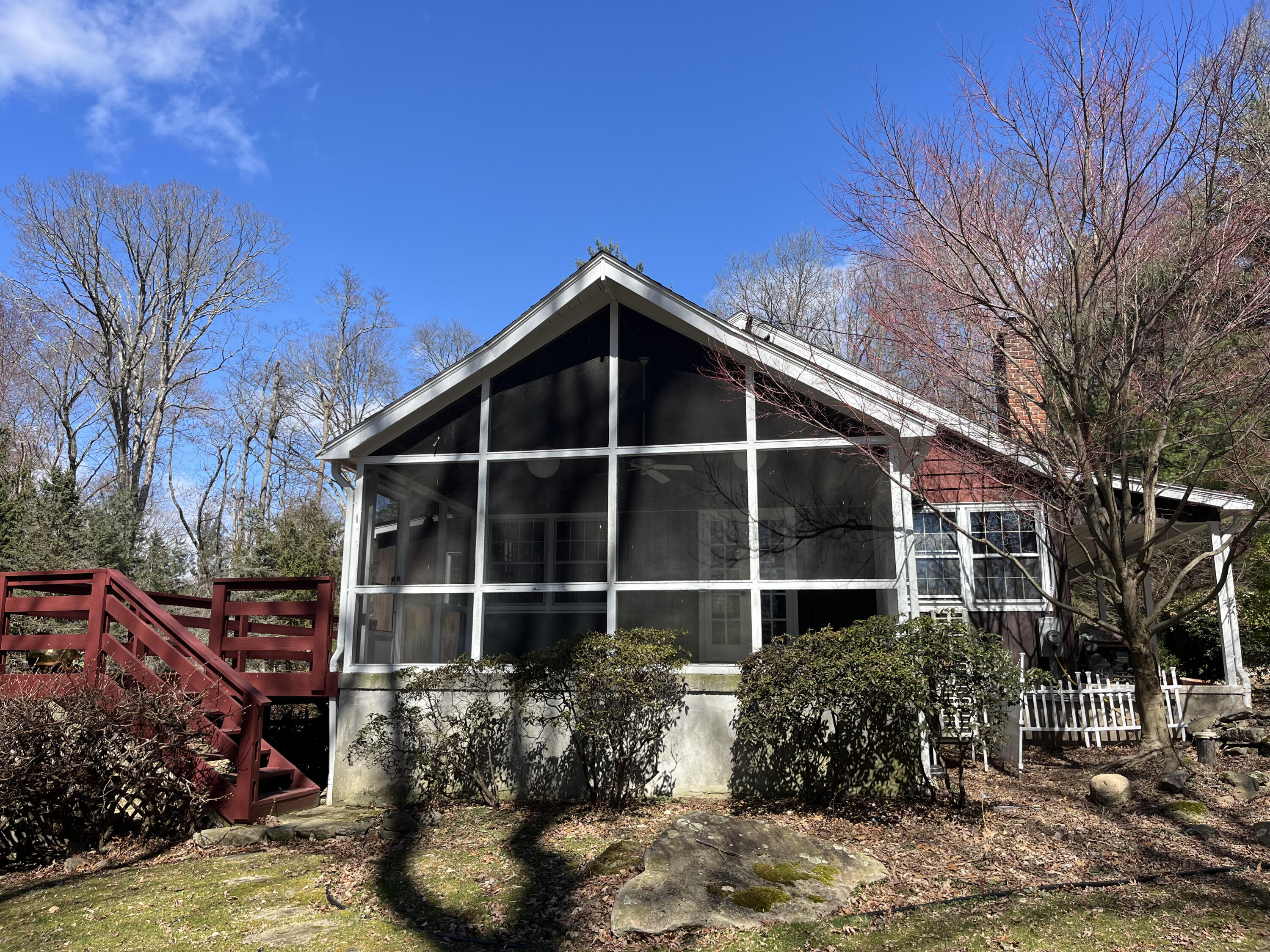 38 Lantern Ridge Road New Canaan, CT 06840 - Photo 11 of 17 a view of a house with a yard