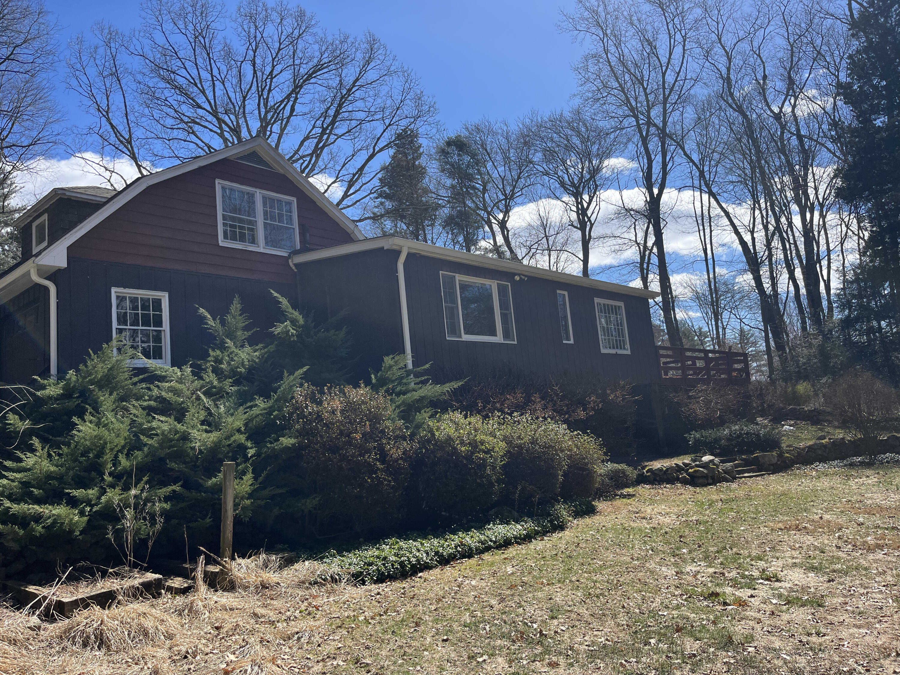 38 Lantern Ridge Road New Canaan, CT 06840 - Photo 14 of 17 a view of a house with a yard