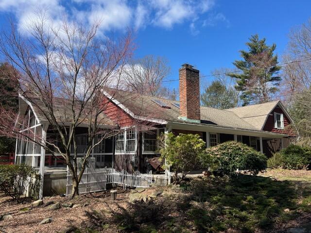 38 Lantern Ridge Road New Canaan, CT 06840 - Photo 17 of 17 a front view of a house with garden