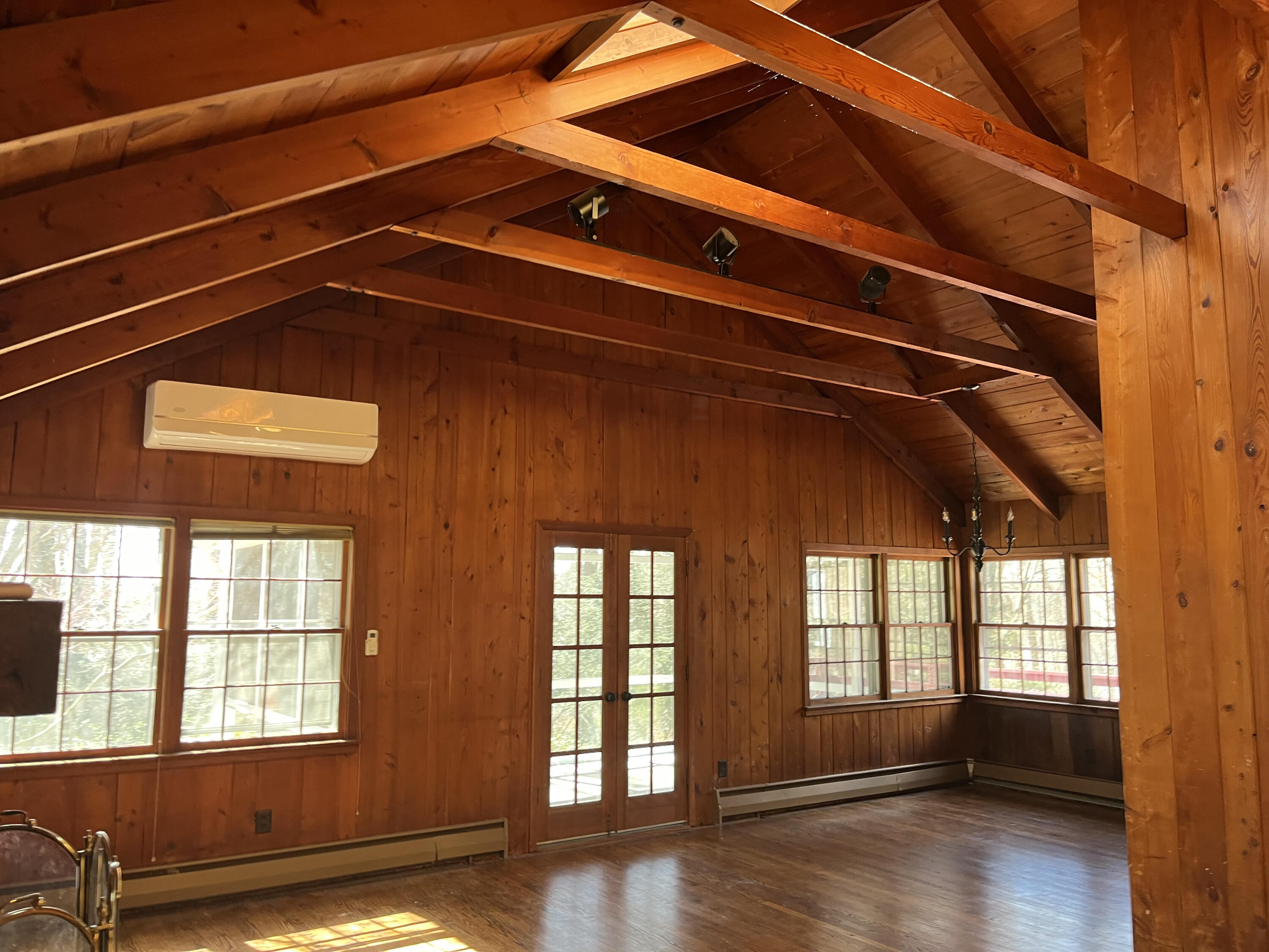 38 Lantern Ridge Road New Canaan, CT 06840 - Photo 9 of 17 a view of an empty room with wooden floor and a window