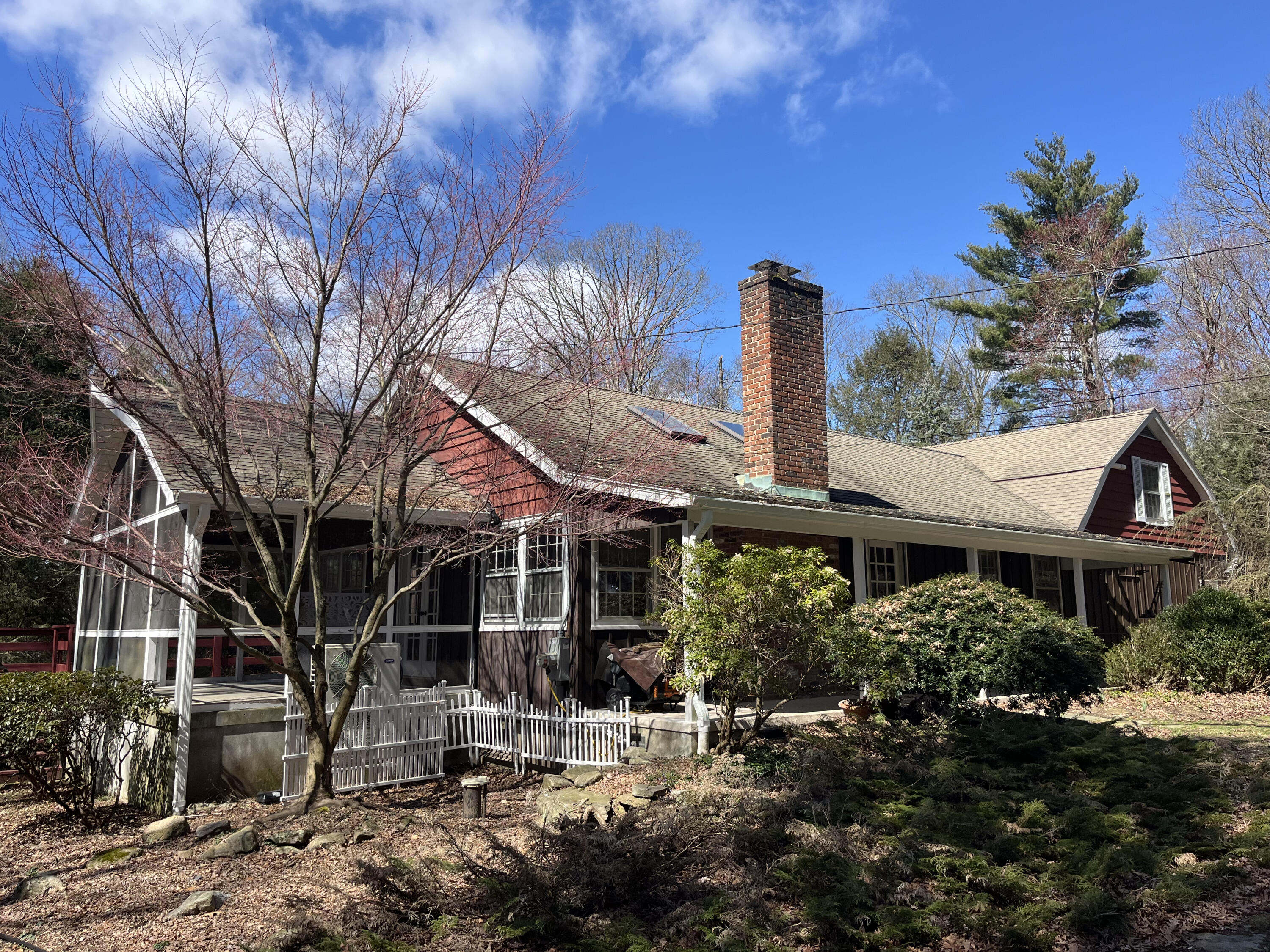 38 Lantern Ridge Road New Canaan, CT 06840 - Photo 10 of 17 a front view of a house with garden
