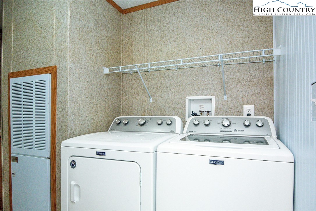 146 Fire House Road Whitetop, VA 24292 - Photo 27 of 44 a utility room with dryer and washer