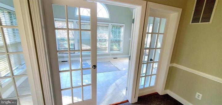 20153 Valhalla Square Ashburn, VA 20147 - Photo 14 of 26 a view of entryway with wooden floor