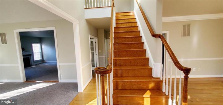 20153 Valhalla Square Ashburn, VA 20147 - Photo 17 of 26 a view of entryway and gallery with wooden floor